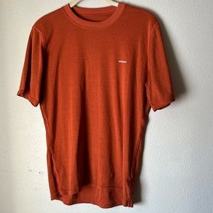 Patagonia women’s  rust colored t-shirt. Size M.